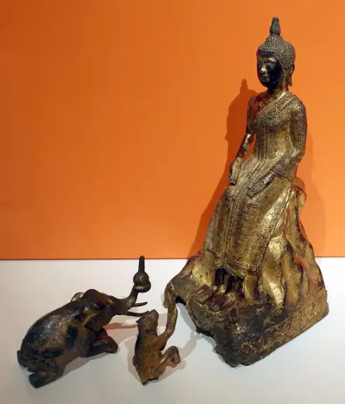 Enthroned Buddha with Elephant and Monkey Paying Homage — Gilded and lacquered bronze