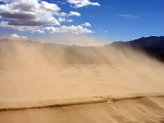 Sand dunes where grains can produce booming or singing sounds.
