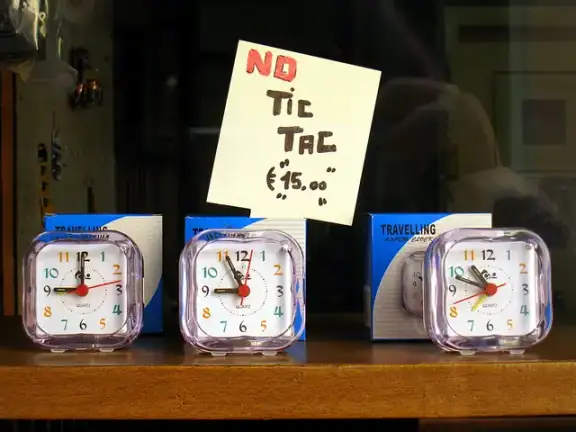 A sign advertising clocks that make no “tic tac” sound.