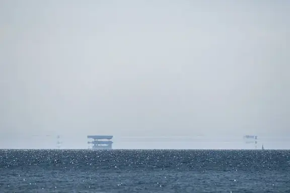 A ferry distorted by a Fata Morgana mirage over the Baltic Sea.