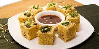 Pieces of steamed dhokla.