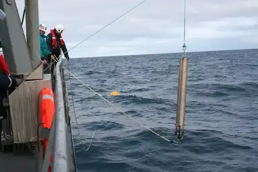 A hydrophone being lowered into the Atlantic Ocean.
